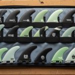 surfboard fin holder protecting fiberglass surf fins during travel